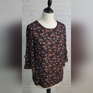 DR2 Blouse size Sm with 3/4 ruffle sleeves with open V line in back